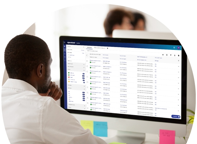 Employee automating EDI on a computer screen.
