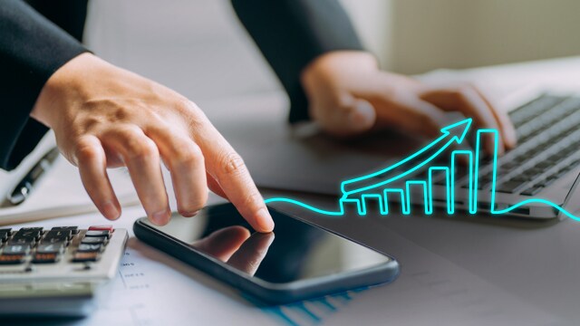 person at work with graph overlay