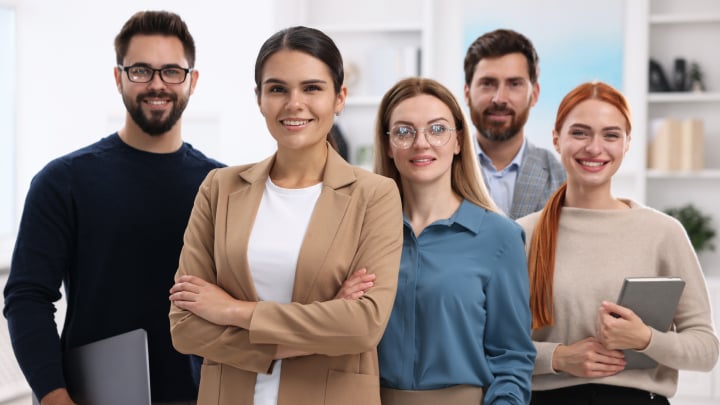 A group of people in a working space 