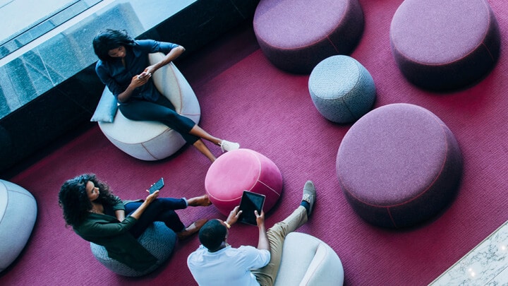 Three people having a brain storming session