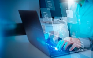 Person typing on computer