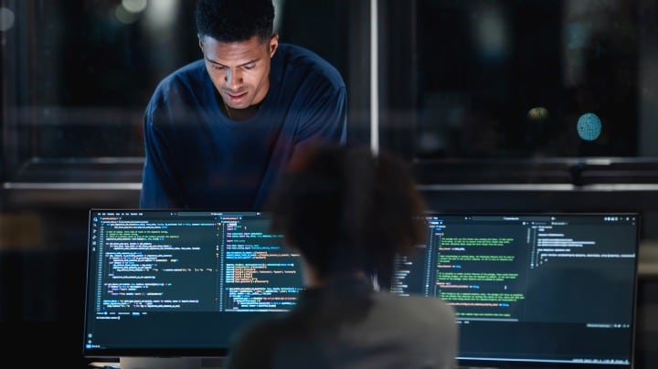  An abstract, digital illustration representing comprehensive application security (DevSecOps), featuring glowing lines of code, network connections, and security icons (like a magnifying glass or shield) on a dark, technical background.