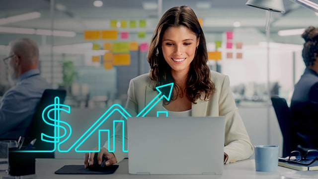 Woman at computer with graph overlay