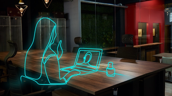 outline of a person working on a laptop