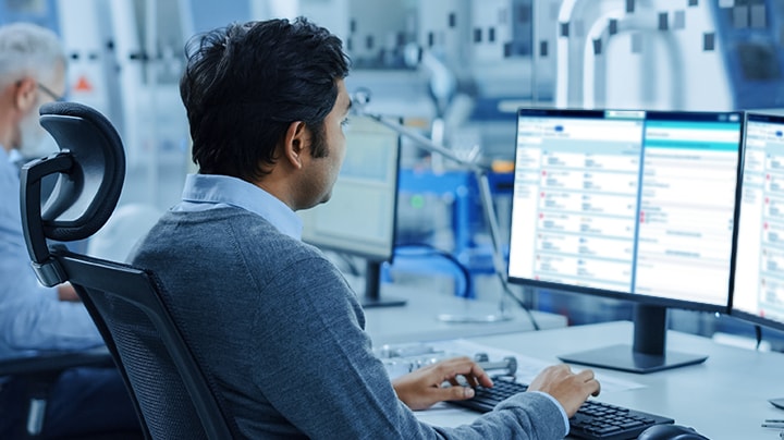 a man works on a computer