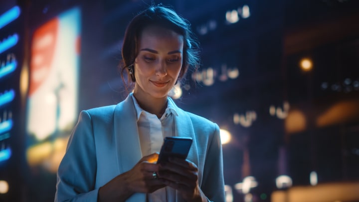 A person looking at their mobile device
