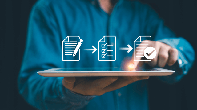 A hand holds a tablet displaying a three-step digital workflow