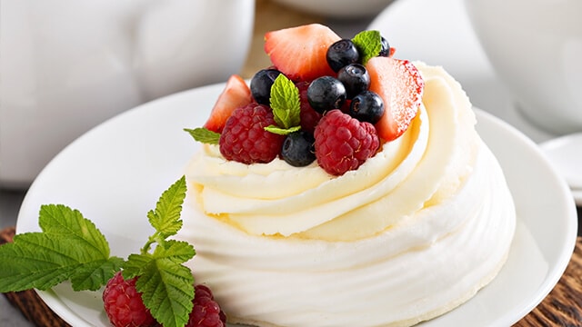 Cake with fruit on-top.
