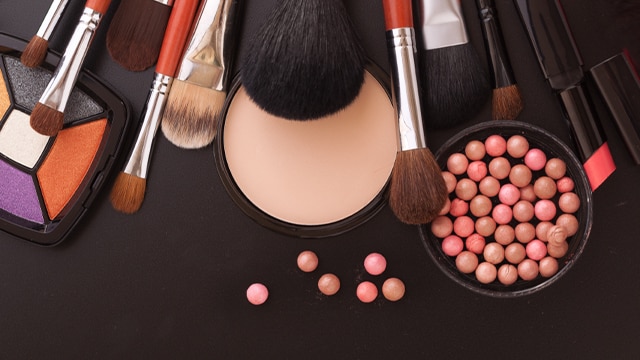 Makeup and brushes on a table