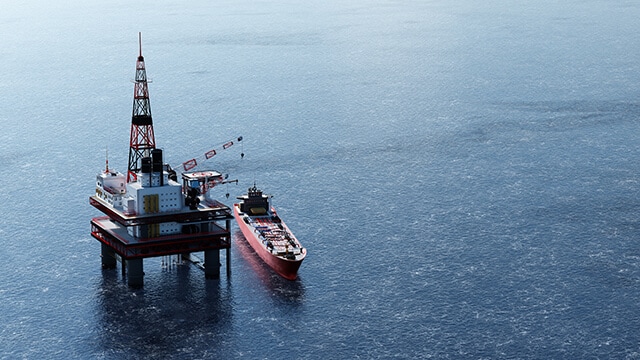 Offshore oil drilling with ship.