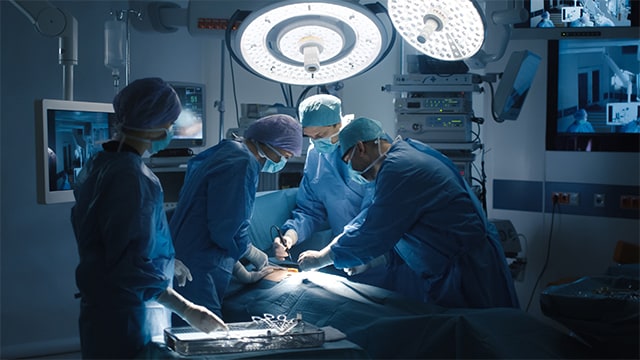 Surgeons in operating room