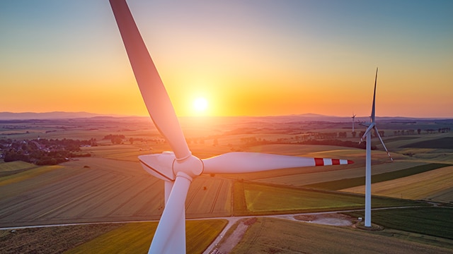 Wind turbine at sunset