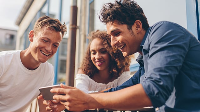 people looking at the phone 