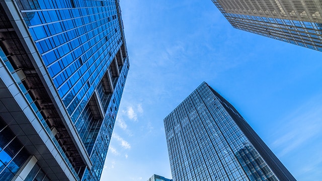 Looking up at buildings.