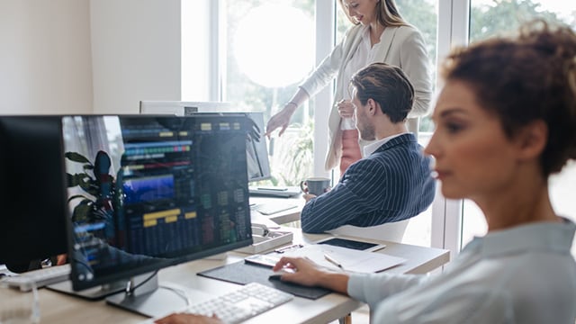 Women working at a computer.