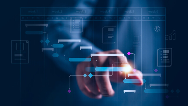 A person interacting with a digital Gantt chart interface