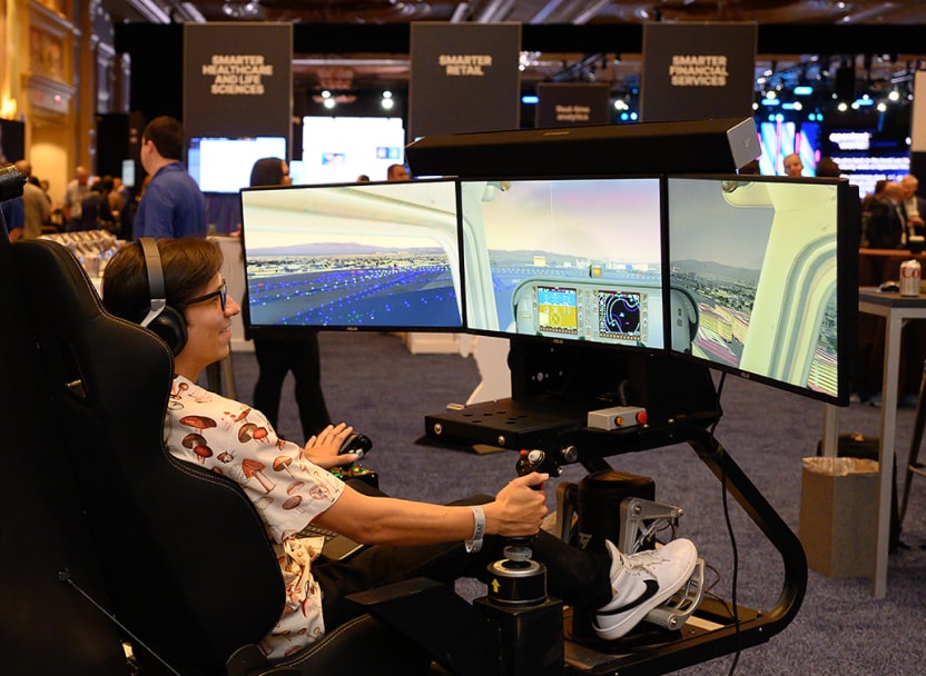 An attendee trying out software at OpenText World 2023