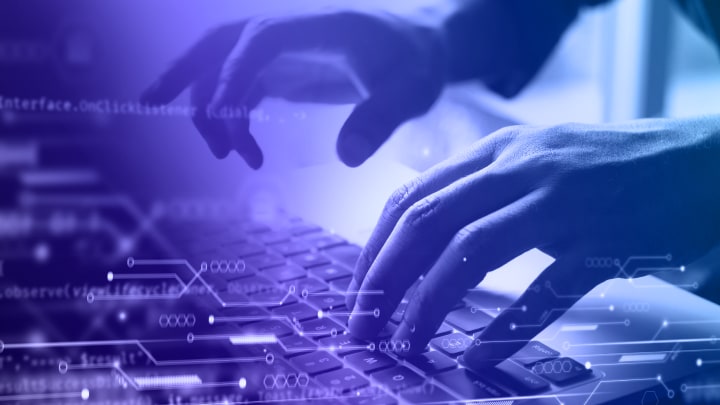  A person working on laptop