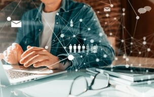 Person typing on a laptop