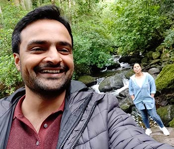 Arzoo and her husband in the forest