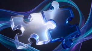 Two puzzle pieces with colorful swirl design